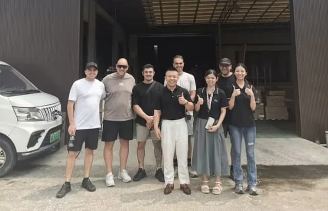 Ceraglow production and export team meeting international tile buyers outside the Foshan factory