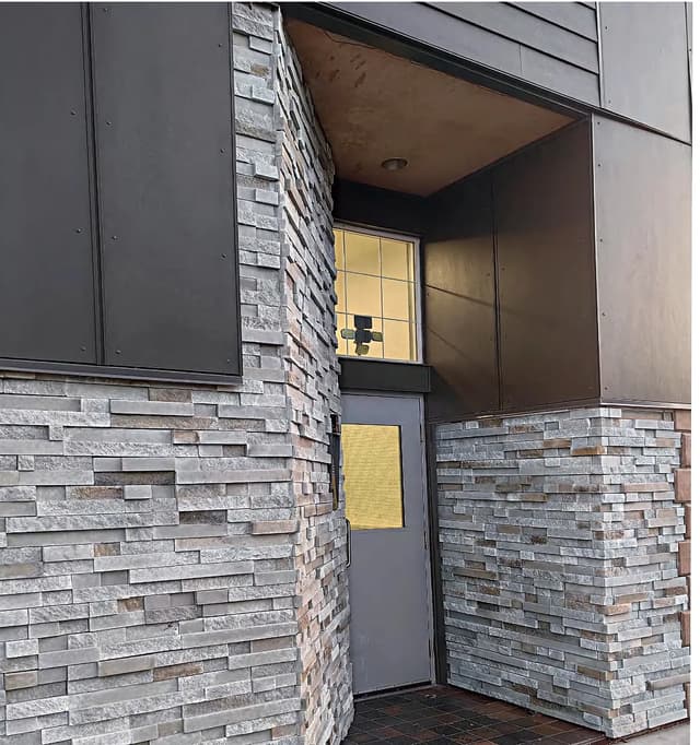 Modern ledge stone used around a contemporary entrance exterior