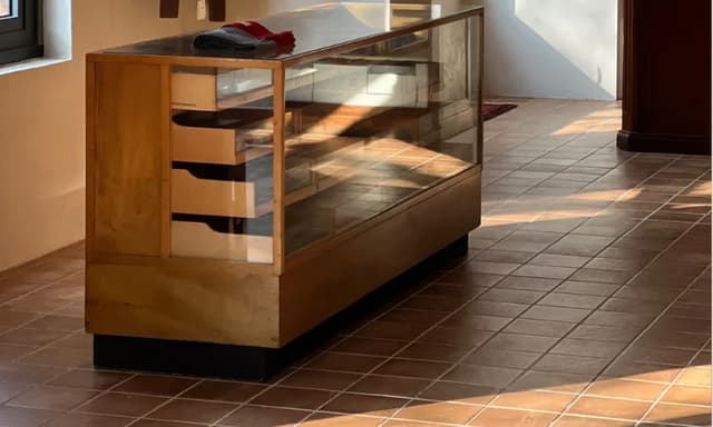 Retail display cabinet on a warm tiled floor in a Ho Chi Minh City store