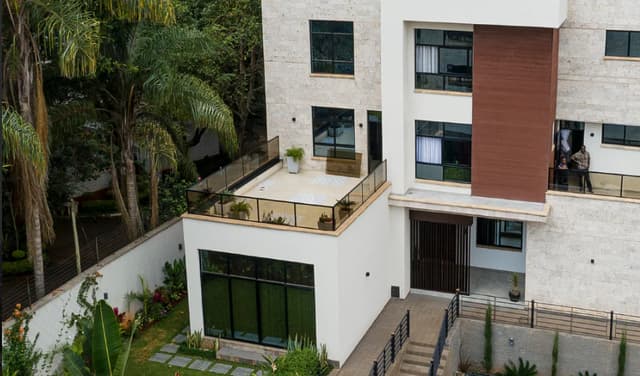 Contemporary Nairobi villa with coordinated indoor and outdoor tile design