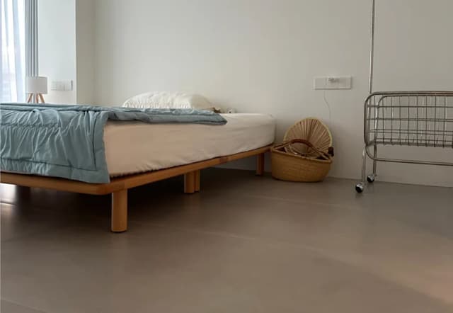 Neutral floor tiles in a completed bedroom of a contemporary Nairobi villa
