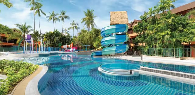 Blue mosaic tiles installed in a resort swimming pool