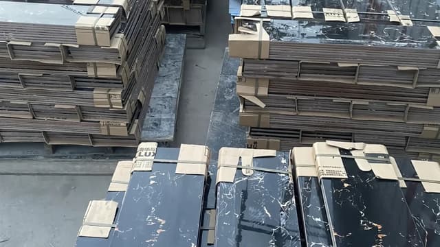 Multiple ceramic tiles arranged for shade pattern and joint inspection