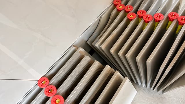 Ceramic tile samples arranged for shade and surface defect inspection