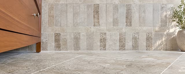 Coordinated wall and floor tiles in a residential interior