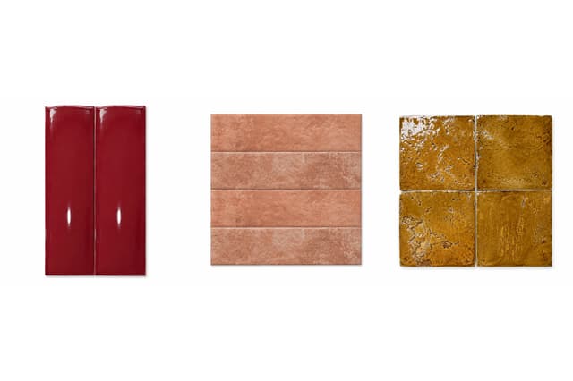 Red glossy, pink matt and ochre textured wall tile samples showing different glazes, surfaces and edges