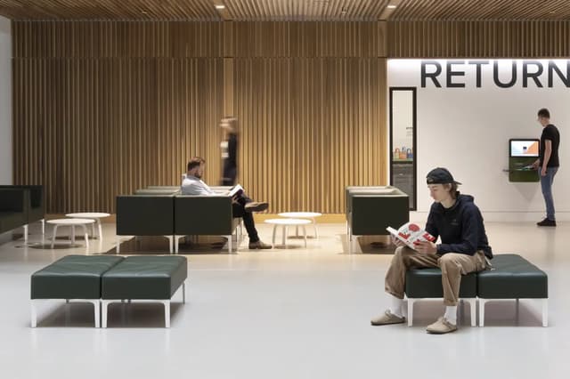 Vancouver Public Library Reading Area Visitors using a calm public library reading area with durable tiled flooring